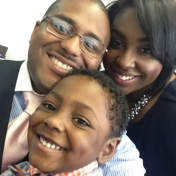 Seen here with his family, Dr. Theodore Turman (center), is excited to lead Ecumenical Theological Seminary, a school with a reputation for teaching social justice and local activism.